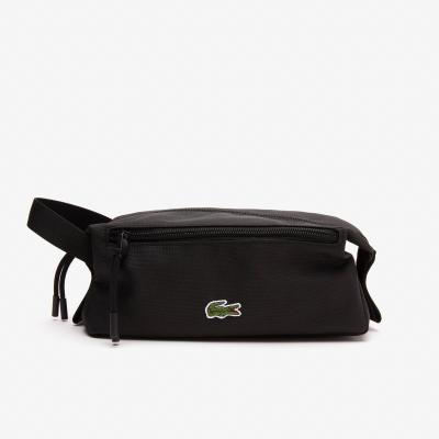 LACOSTE  Trousse de toilette noire zipp&eacute;e. Couleur: Noir