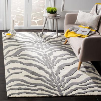 SAFAVIEH Tapis de salon interieur en ivoire & gris fonce, 122 x 183 cm
