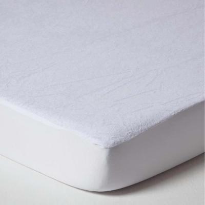 HOMESCAPES Prot&egrave;ge matelas imperm&eacute;able &eacute;ponge pour lit b&eacute;b&eacute;, 60 x 120 cm, Lot de 2
