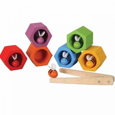 PLAN TOYS  Jeu en bois Nids d'Abeilles