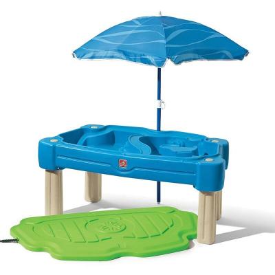 Table sable et eau cascade avec parasol 850900