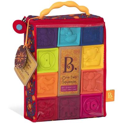 B. TOYS B Toys - Cubes - One Two Squeeze orange